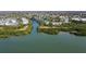 Water view of condos on canal surrounded by mangroves with beautiful bay and city views at 9920 Indian Key Trl # 29, Seminole, FL 33776