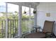 Relaxing outdoor balcony offering serene views of the surrounding landscape at 9920 Indian Key Trl # 29, Seminole, FL 33776