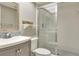 Well-maintained bathroom with a updated sink and glass shower at 9920 Indian Key Trl # 29, Seminole, FL 33776