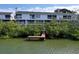 Waterfront condos boast private docks and serene views from screened balconies at 9920 Indian Key Trl # 29, Seminole, FL 33776