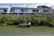 Waterfront condos boast private docks and serene views from screened balconies at 9920 Indian Key Trl # 29, Seminole, FL 33776