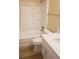 Bathroom features a white vanity and a shower-tub combination, providing a clean and functional space at 9346 52Nd Way, Pinellas Park, FL 33782