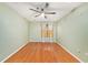 Bright bedroom with hardwood flooring, neutral paint and recessed lighting at 1000 W Horatio St # 327, Tampa, FL 33606