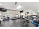 Community gym with treadmills, weights, and televisions at 1000 W Horatio St # 327, Tampa, FL 33606