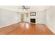 Bright living room featuring hardwood floors, and a fireplace at 1000 W Horatio St # 327, Tampa, FL 33606