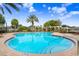 The community pool offers a refreshing escape with ample space for lounging and enjoying the sunny weather at 12402 Country White Cir, Tampa, FL 33635