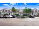 Well-maintained townhomes featuring assigned parking, complemented by lush landscaping and serene surroundings at 12402 Country White Cir, Tampa, FL 33635