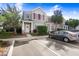 Charming townhome featuring well-maintained landscaping and convenient parking at 12402 Country White Cir, Tampa, FL 33635