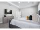 Bedroom featuring recessed lighting, a large window, and stylish gray-toned furniture at 1409 W Wood St, Tampa, FL 33604