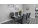 Modern dining room featuring a glass table, contemporary chairs, and stylish wall decor at 1409 W Wood St, Tampa, FL 33604