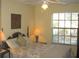 Cozy bedroom featuring a window and natural light at 1440 Hales Hollow Dr, Dunedin, FL 34698