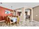 Formal dining room with seating for eight, featuring archways leading to the living and Gathering rooms at 1604 Mira Lago Cir, Ruskin, FL 33570