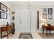 Inviting foyer with decorative accents, leading to the main living areas of the home at 18836 Autumn Lake Blvd, Hudson, FL 34667