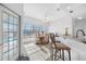 Bright breakfast nook featuring a waterfront view and seating at the breakfast bar at 2011 Captiva Ct, Sun City Center, FL 33573