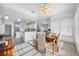 Open dining area with a view of the kitchen and lots of light at 2011 Captiva Ct, Sun City Center, FL 33573