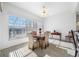 Dining area filled with natural light from the large window at 2011 Captiva Ct, Sun City Center, FL 33573