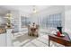 Bright dining nook with a view of the pool at 2011 Captiva Ct, Sun City Center, FL 33573