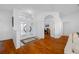 Bright foyer with hardwood floors and decorative glass doors at 2011 Captiva Ct, Sun City Center, FL 33573