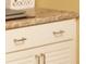 Close up of custom white cabinets and drawers in the living space at 2025 Grantham Greens Dr # 52, Sun City Center, FL 33573