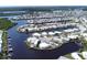 An aerial view of the waterfront community with homes situated on canals and waterways at 204 El Prado, North Port, FL 34287