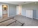 This bedroom leads to the bathroom with a chest of drawers and a metal bedframe at 204 El Prado, North Port, FL 34287