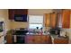 Bright kitchen featuring modern appliances and a window view above the sink at 2414 E 8Th Ave, Tampa, FL 33605