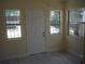 Bright room with tiled floors, natural light, and multiple windows for scenic views at 2414 E 8Th Ave, Tampa, FL 33605