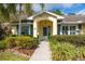 Welcoming front door with decorative details and manicured landscaping at 29447 Schinnecock Hills Ln, San Antonio, FL 33576