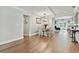 Bright dining room area with hardwood floors and stylish furniture at 3213 W Cass St, Tampa, FL 33609