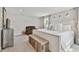 Serene main bedroom with neutral tones, soft carpet, and comfortable furnishings at 3213 W Cass St, Tampa, FL 33609