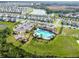 Beautiful aerial view of the pool and playground in a well-maintained community at 33065 Major Oak Dr, Wesley Chapel, FL 33545