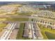 Aerial view of a residential community showcasing the neighborhood's layout, surrounding lakes, and convenient parking at 33065 Major Oak Dr, Wesley Chapel, FL 33545