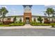 Beautiful Westgate at Avalon Park clubhouse entrance with manicured landscaping at 33065 Major Oak Dr, Wesley Chapel, FL 33545