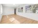 Bright living room with wood floors, recessed lighting, and natural light from windows at 3412 71St N St, St Petersburg, FL 33710