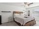 Bright main bedroom featuring lots of natural light and a ceiling fan at 36642 Garden Wall Way, Zephyrhills, FL 33541