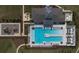 An overhead view of a resort style community pool with playground and recreation center at 36642 Garden Wall Way, Zephyrhills, FL 33541