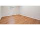 Bright bedroom with hardwood flooring, white walls and window for natural light at 3908 W Laurel St, Tampa, FL 33607