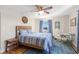 Cozy bedroom with blue accents, natural light, and a comfortable sleeping area at 420 64Th Ave # 402, St Pete Beach, FL 33706