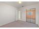 Bright bedroom featuring carpet, light walls, and a closet with mirrored sliding doors at 4435 34Th N Ave, St Petersburg, FL 33713