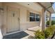 Covered front porch with a classic door, decorative details, and a tidy, welcoming entrance at 4435 34Th N Ave, St Petersburg, FL 33713