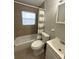 Cozy bathroom with a tub-shower combination, toilet, and vanity at 4790 81St N Ave, Pinellas Park, FL 33781