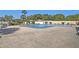 Inviting community pool with comfortable lounge chairs and a spacious patio area for relaxation and social gatherings at 4812 Jasper Dr Dr # 101, New Port Richey, FL 34652