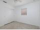 Cozy bedroom featuring terrazzo floors, a ceiling fan, closet, and one window at 4837 97Th N Way, St Petersburg, FL 33708