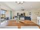 View of the screened lanai and living room from the dining area table at 4911 Sienna Isles Ave, Wimauma, FL 33598