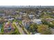 Aerial view of the neighborhood showcasing the house and lush surroundings at 531 Danube Ave, Tampa, FL 33606