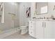 Elegant bathroom with a glass shower, sleek white vanity, and modern fixtures at 531 Danube Ave, Tampa, FL 33606