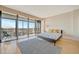 Main bedroom with balcony access and scenic city views at 5396 Gulf Blvd # 904, St Pete Beach, FL 33706