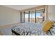 Main bedroom with balcony access and scenic ocean views at 5396 Gulf Blvd # 904, St Pete Beach, FL 33706