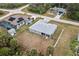 Aerial image showcases backyard, home exterior, and proximity to other homes at 6131 Tedder St, Port Charlotte, FL 33981