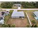 An aerial shot showcases the home's backyard and surrounding area at 6131 Tedder St, Port Charlotte, FL 33981